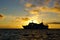 Galapagos Islands cruise ship in sunset