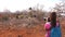 Galapagos tourist and bird photographer taking pictures of Frigatebirds birds