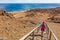 Galapagos tourist hiking enjoying famous Bartolome Island