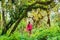 Galapagos tourist walking in Highland forest on Santa Cruz Island in Galapagos