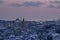 Galata tower in Istanbul, Turkey. Aerial view of landmark at golden hour with beautiful sunlight. Snow and winter season view in