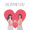 Galentines day. Two young women are drinking wine on a red heart background