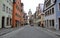 Galgengasse, medieval street in the old town, view toward White Tower, Rothenburg ob der Tauber, Germany