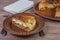 Galician empanada pie in a ceramic dish. The Spanish national dish. Close-up.