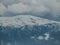 Galicica mountain top with winter snow and clouds