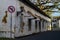 Galle Fort streets Colonial style building and paved road and no turning road sign