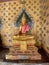 Gallery with old vessels of the seated Buddha in the Buddhist temple Wat Arun. Bangkok, Thailand