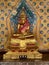 Gallery with old vessels of the seated Buddha in the Buddhist temple Wat Arun. Bangkok, Thailand