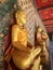 Gallery with old vessels of the seated Buddha in the Buddhist temple Wat Arun. Bangkok, Thailand