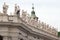 Gallery of saints, fragment of colonnade of St. Peters Basilica, Rome