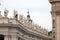 Gallery of saints, fragment of colonnade of St. Peters Basilica, Rome