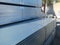 Galvanized metal profiles for construction work are packaged at the wholesale base of building materials and are ready for