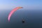 GALVESTON ISLAND, TEXAS, USA - JUNE 9, 2018: Spectacular aerial view of a powered paraglider in flight.