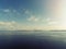 Galway bay, Atlantic ocean, blue cloudy sky and Burren mountains in the background