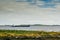 Galway bay, Ireland - 10.15.2021: Wilson Bremen general cargo ship leaving Galway port. International trade, import and export