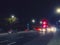 Galway city, Ireland - 22.11.2021: Busy traffic on Headford road at night. City commute problem. Illuminated car on a city road at