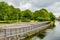 Galway, Connacht province, Ireland. June 11, 2019. Pedestrian walkway with ramps and metal fences next to the Eglinton Canal