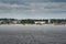 Galway, Ireland - 18.06.2021: Salthill promenade and fun fair. Cloudy sky. View from the ocean