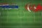 Gambia vs Turkey Soccer Match, national colors, national flags, soccer field, football game, Copy space
