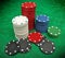 Gambling chips over green felt