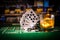 gambling, fortune, game and entertainment concept - close up of casino chips and whisky glass on table