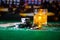 gambling, fortune, game and entertainment concept - close up of casino chips and whisky glass on table