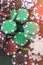 Gambling poker chips on green play field for luck game. Poker chance or risk