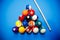 The game of American billiards. Multi-colored billiard balls on gaming table.