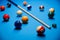 The game of American billiards. Multi-colored billiard balls on gaming table.