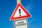 Game changer - traffic sign with exclamation mark to alert, warn caution