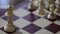 Game of chess. Man`s hand moves a chess piece to victory. Strategy concept