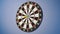 A game of darts. Throwing darts at the target. And someone will throw darts on a dartboard. A dartboard hanging on a