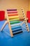 game scores for children on a stand stand on a blue game table.