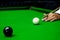 Game snooker billiards or opening frame player ready for the ball shot, athlete man kick cue on the green table in bar