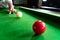 Game snooker billiards or opening frame player ready for the ball shot, athlete man kick cue on the green table in bar