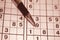 Game Sudoku and ballpoint pen