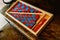 Game to learn to count, made of blue and red wood, inside a classroom montessori