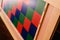 Game to learn to count, made of blue and red wood, inside a classroom montessori