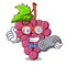 Gamer red grapes fruit above mascot table