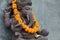 Ganesha with balinese Barong masks, flowers necklace and ceremonial offering