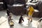 Gang of penguins attack little cute boy to take away the lollipop