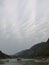 Ganges river on a cloudy day with wave cloud formation