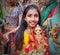 Gangore festival of Rajasthan were little girl holding a statue of Devi Parvati for performing rituals