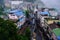 Gangtok, Sikkim - June 16 2022, Tourists enjoy a ropeway cable car ride over Gangtok city. Amazing aerial cityscape of Sikkim.