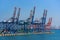 Gantry cranes on container terminal piers. Busan, South Korea