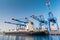 Gantry cranes load container ship