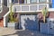 Garage below the porch of townhouse with cactus at the front in San Francisco, California