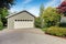 Garage with concrete driveway