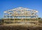 Garage construction in suburbia, USA. Wood, wooden roof truss system. Suburban building.