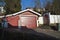 Garage and gate built in wood and masonry.